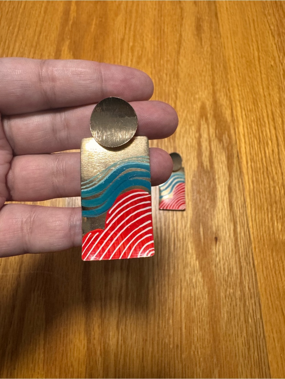 Handmade Gold Wave Pattern Wall Accents with Red and Teal Painted Design